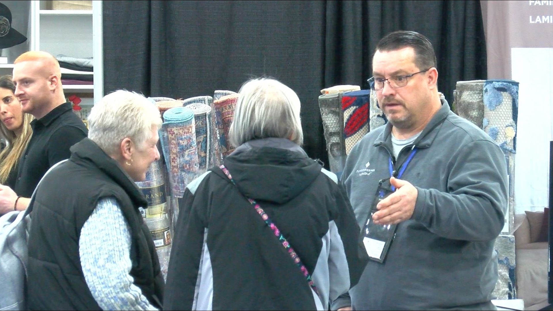 Home improvement specialists meet with homeowners