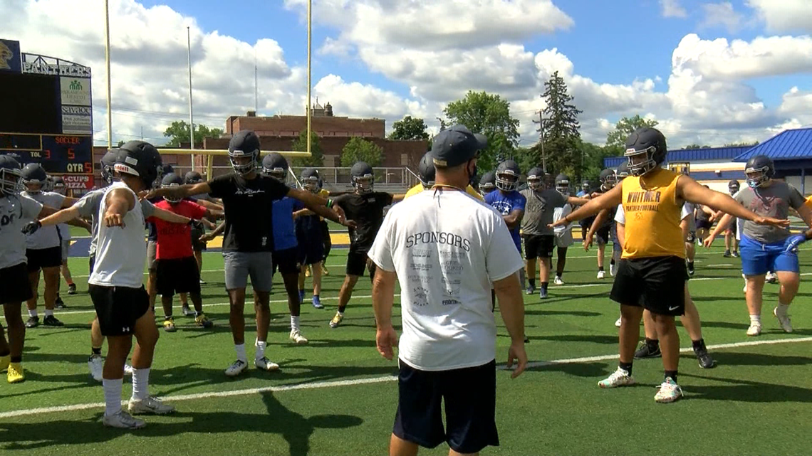 High school football teams hit the field for practice