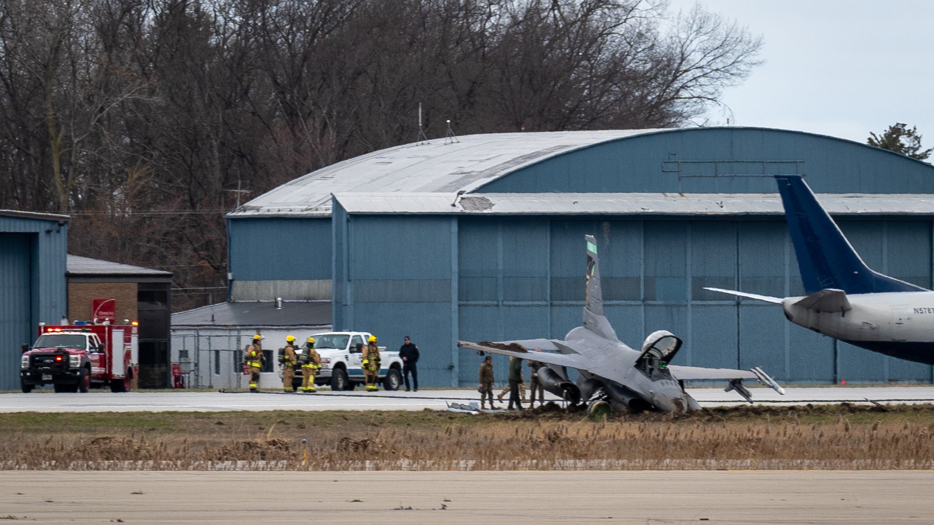 The pilot safely exited the aircraft, officials say.