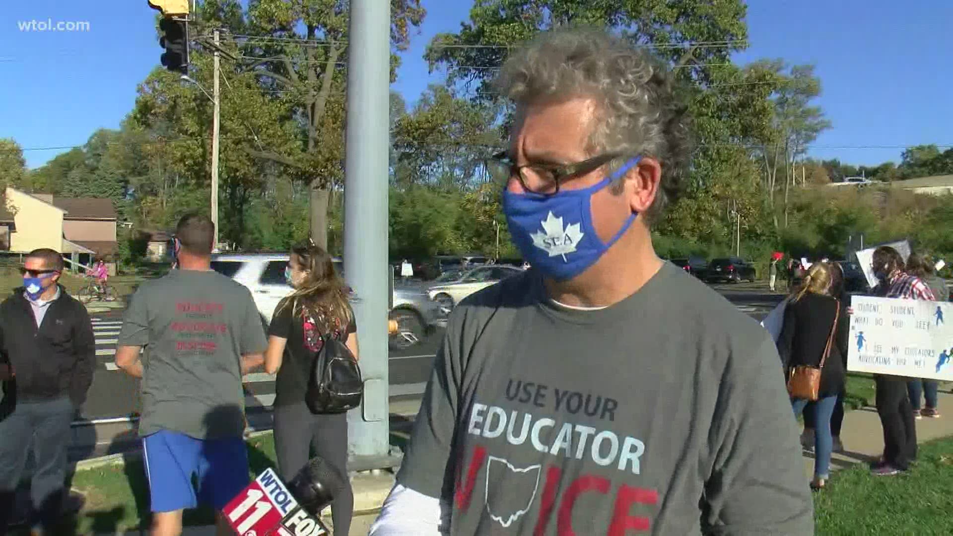 Teachers, parents and students showed up in the hundreds to support a rally for teachers' voices to be heard during decision-making processes in the district.