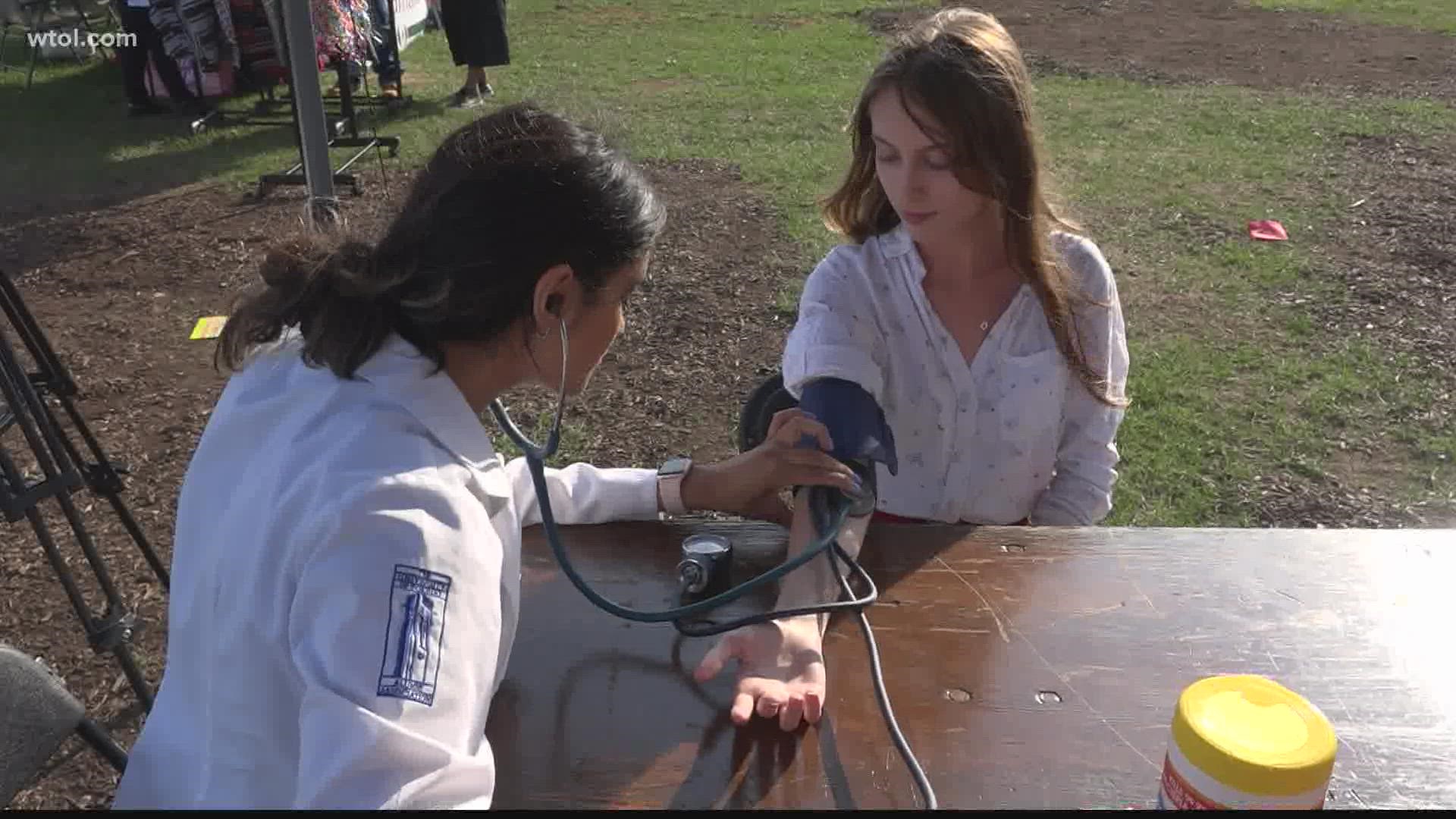 The University of Toledo's club of pre-medical students, Spanish Médica,  had a tent at the event where they worked to inform the community about hypertension.