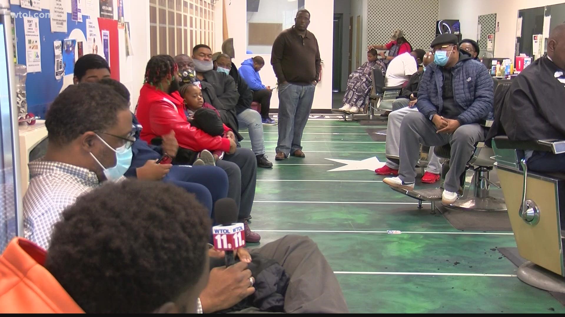 Around a dozen men in the Black community participated in a discussion on recent gun violence in Toledo at Steve's Sport N Cuts in west Toledo.