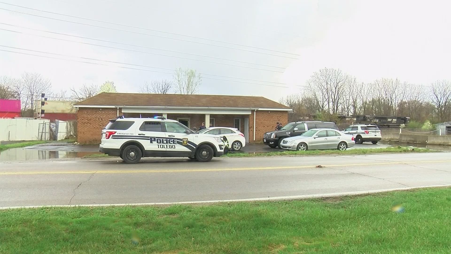 Toledo Police pursued a similar vehicle to the robbers', resulting in a barricaded suspect, but Maumee Police confirmed that car did not belong to the robbers.