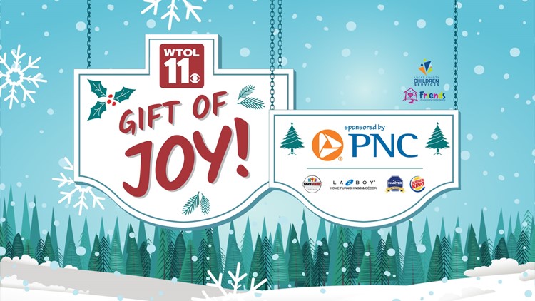 Downtown gift drop for WTOL 11 Gift of Joy campaign Thursday, Dec. 8