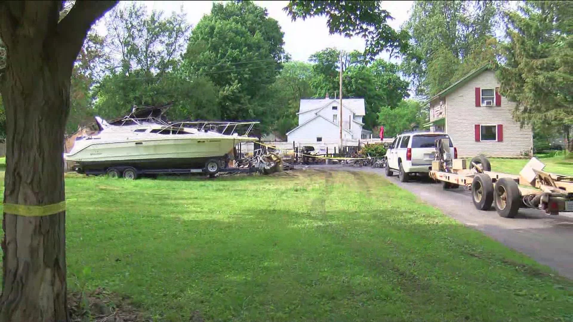 Firefighters arrived on the scene and found the garage fully engulfed in flames as family members attempted to rescue the boy, who was trapped inside.