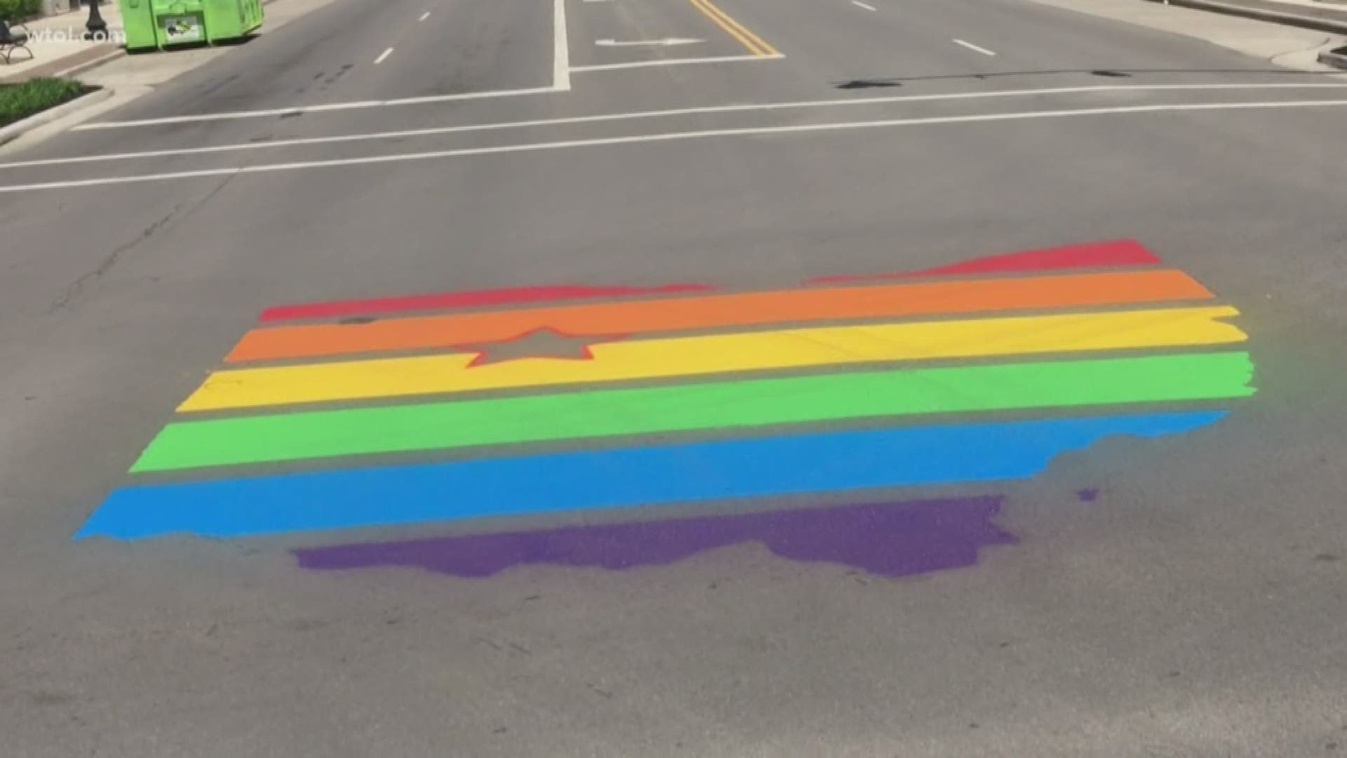 The group is using art in three locations in the city to promote the pride event next Saturday.