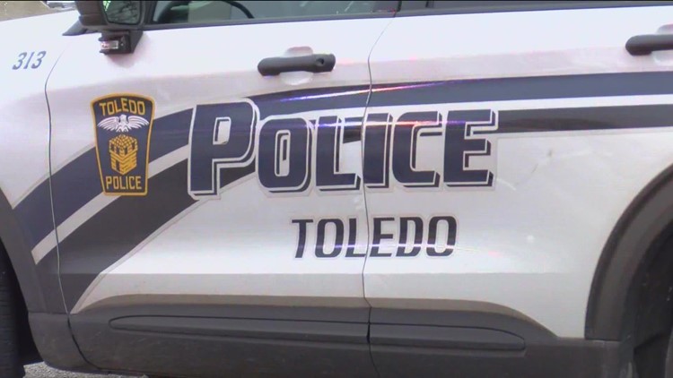 Man arrested, accused of throwing brick at Toledo police vehicle