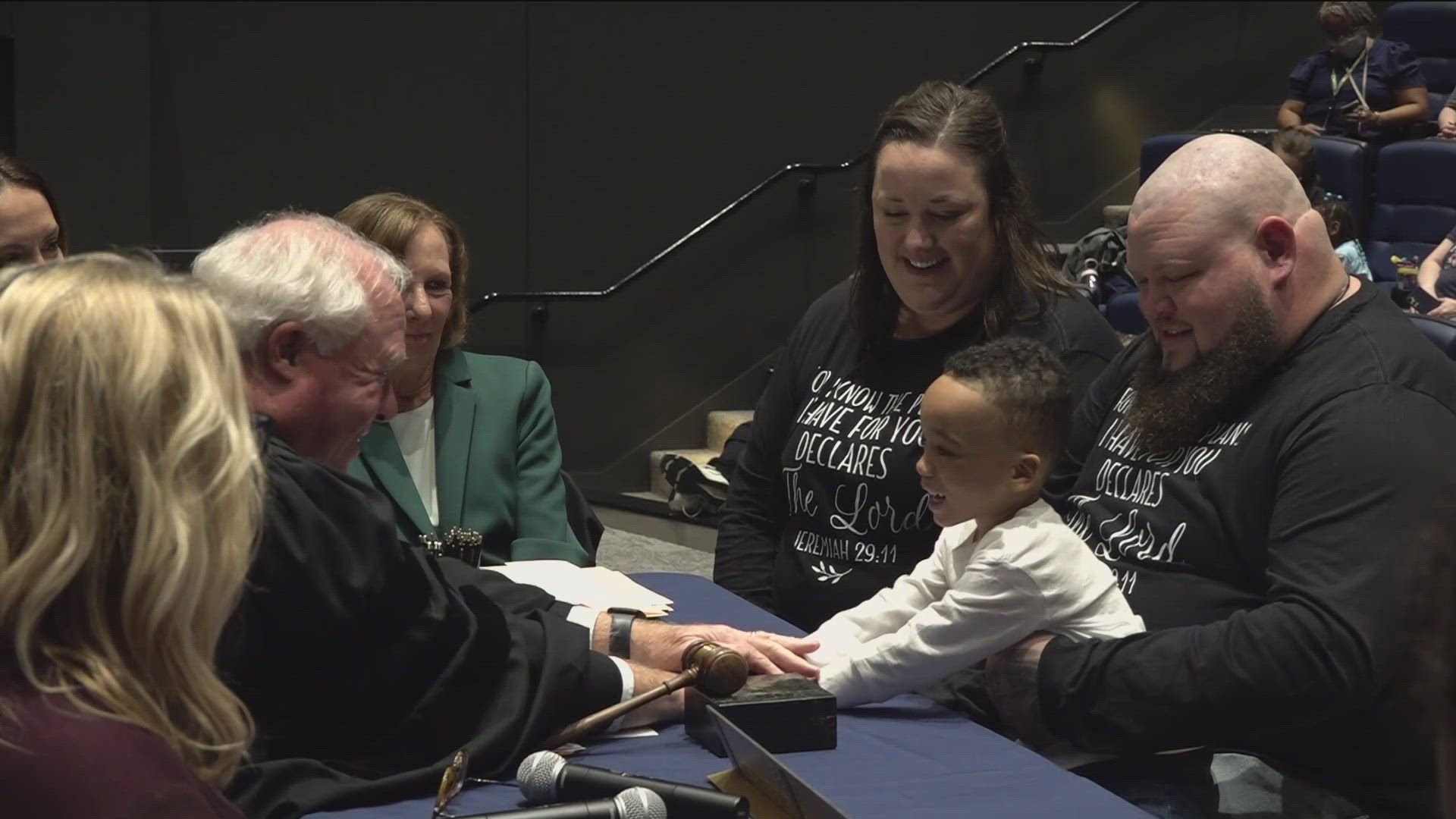 Lucas County Children Services celebrated the adoption of six children during a heartwarming ceremony at Imagination Station on Tuesday. Savion Hahn is one of them.