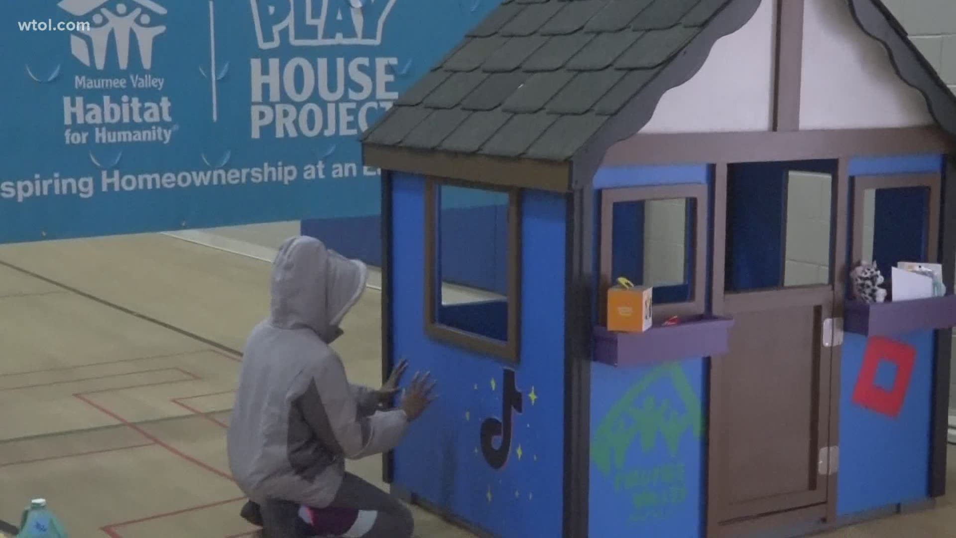 St. Joseph Parish School in Sylvania took a day off from learning to get their hands dirty with Habitat for Humanity by building a playhouse for a young girl.