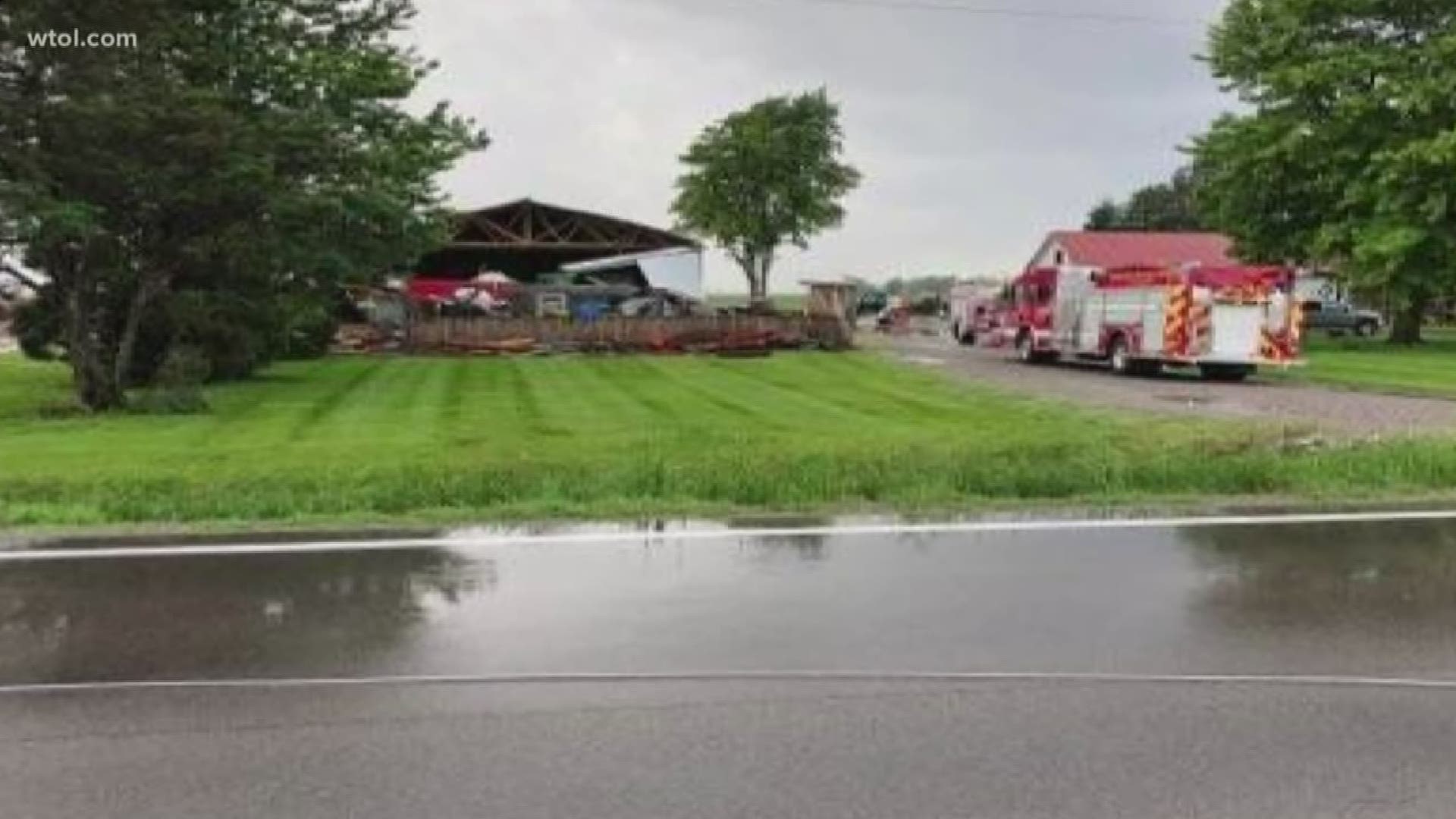 Structural damage is reported to a barn and poles and power lines are down in Henry County.