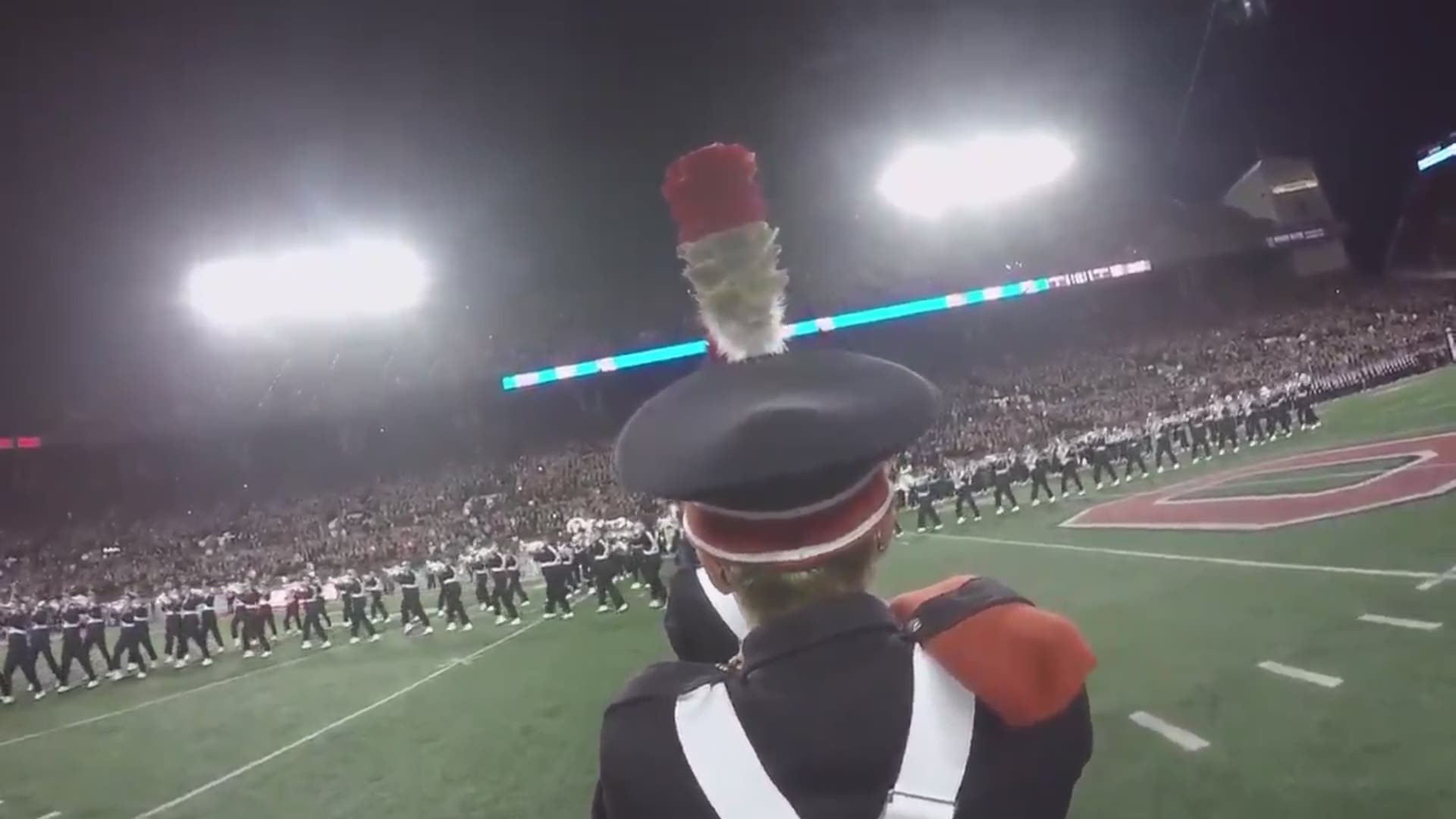 Get a front row seat to TBDBITL and experience the honor of dotting the "i" during "Script Ohio!"