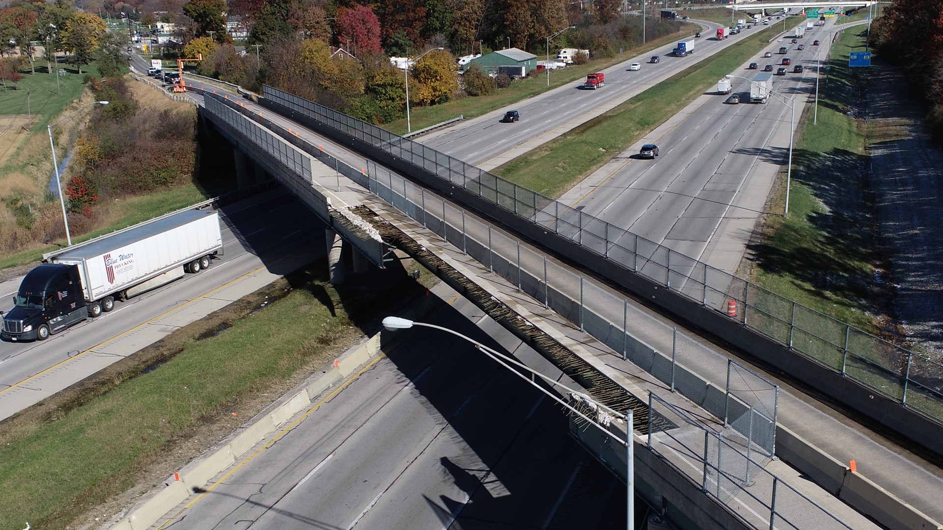 The bottom of the overpass was struck in February 2023 by a semi-truck carrying an oversized load that was too tall.