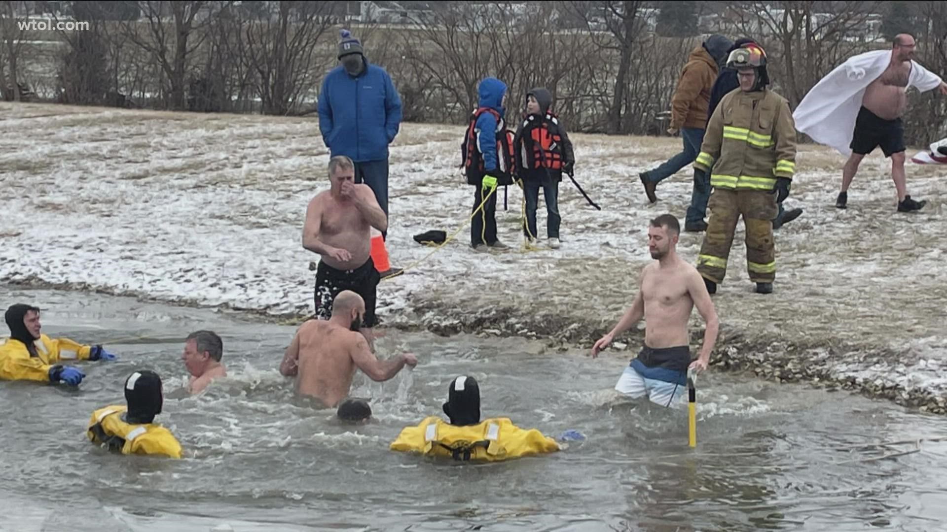 Over 100 brave chilly water for Tiffin Polar Bear Jump wtol