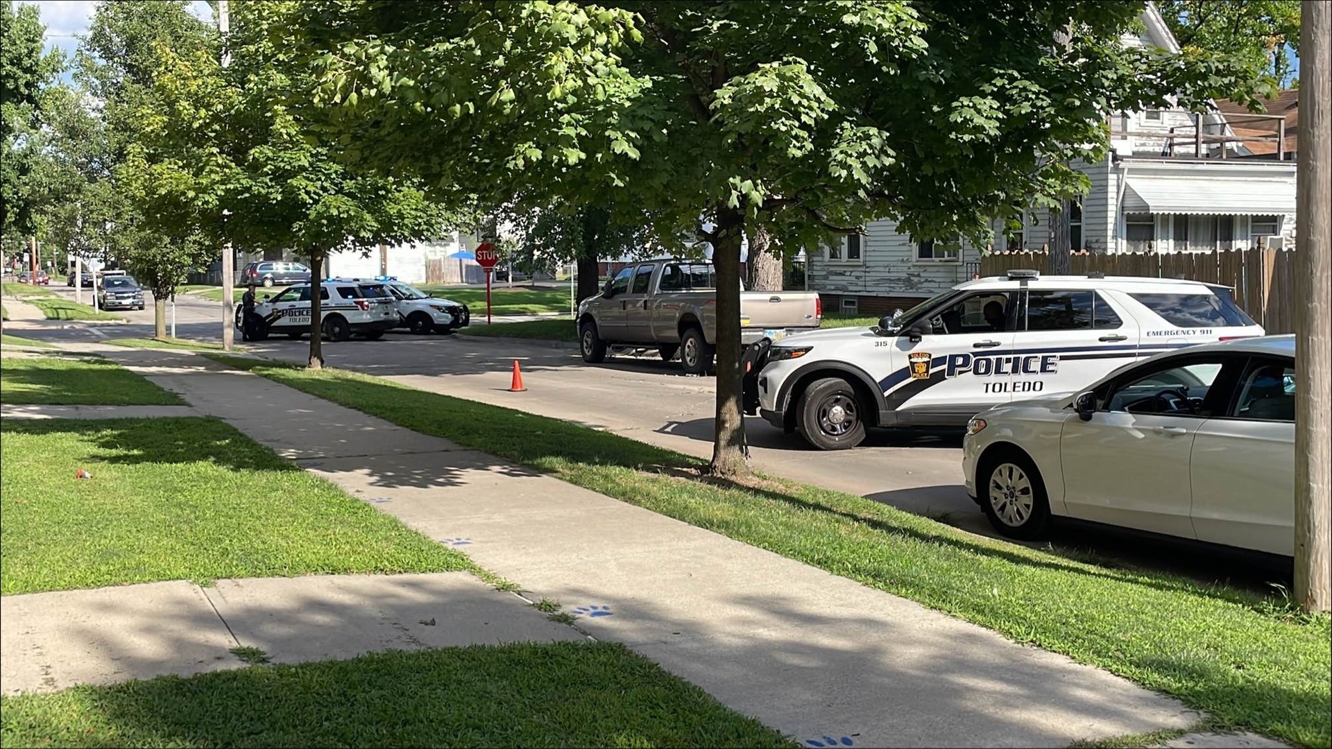 A Toledo Public Schools spokesperson confirms Arlington Elementary went on lockdown after parents got into a fight and one shot a gun into the air around dismissal.