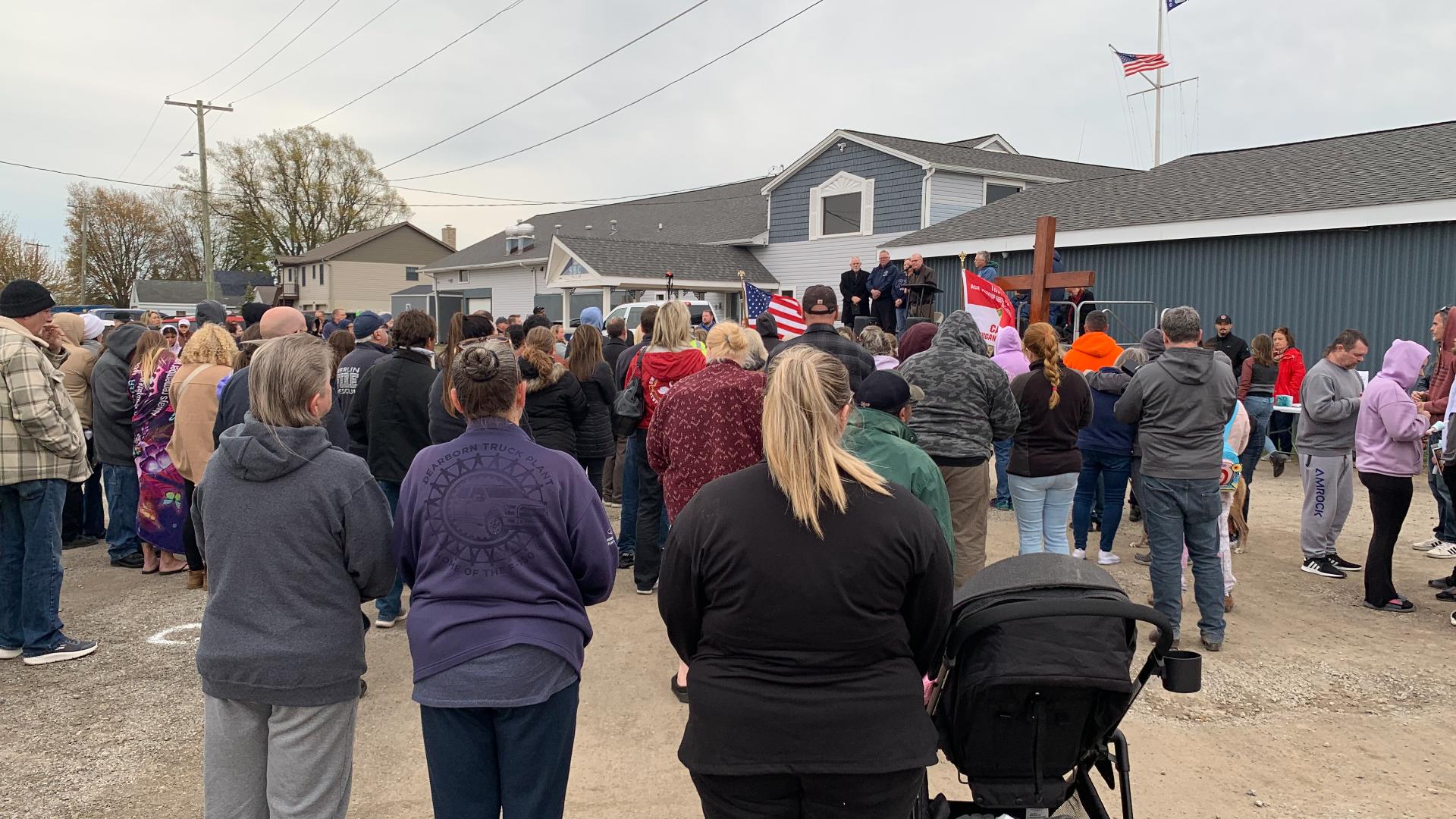 People gathered at the Swan Boat Club Friday for a candlelight vigil dedicated to victims of the crash that killed two siblings and injured several others.