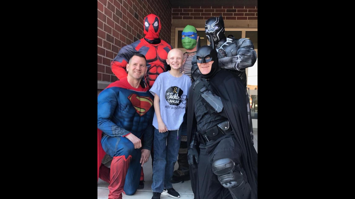 Toledo police SWAT team become superheroes for sick boy | wtol.com