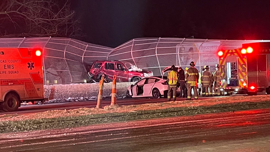 SUV embedded into Anthony Wayne Trail overpass fence after two vehicle ...