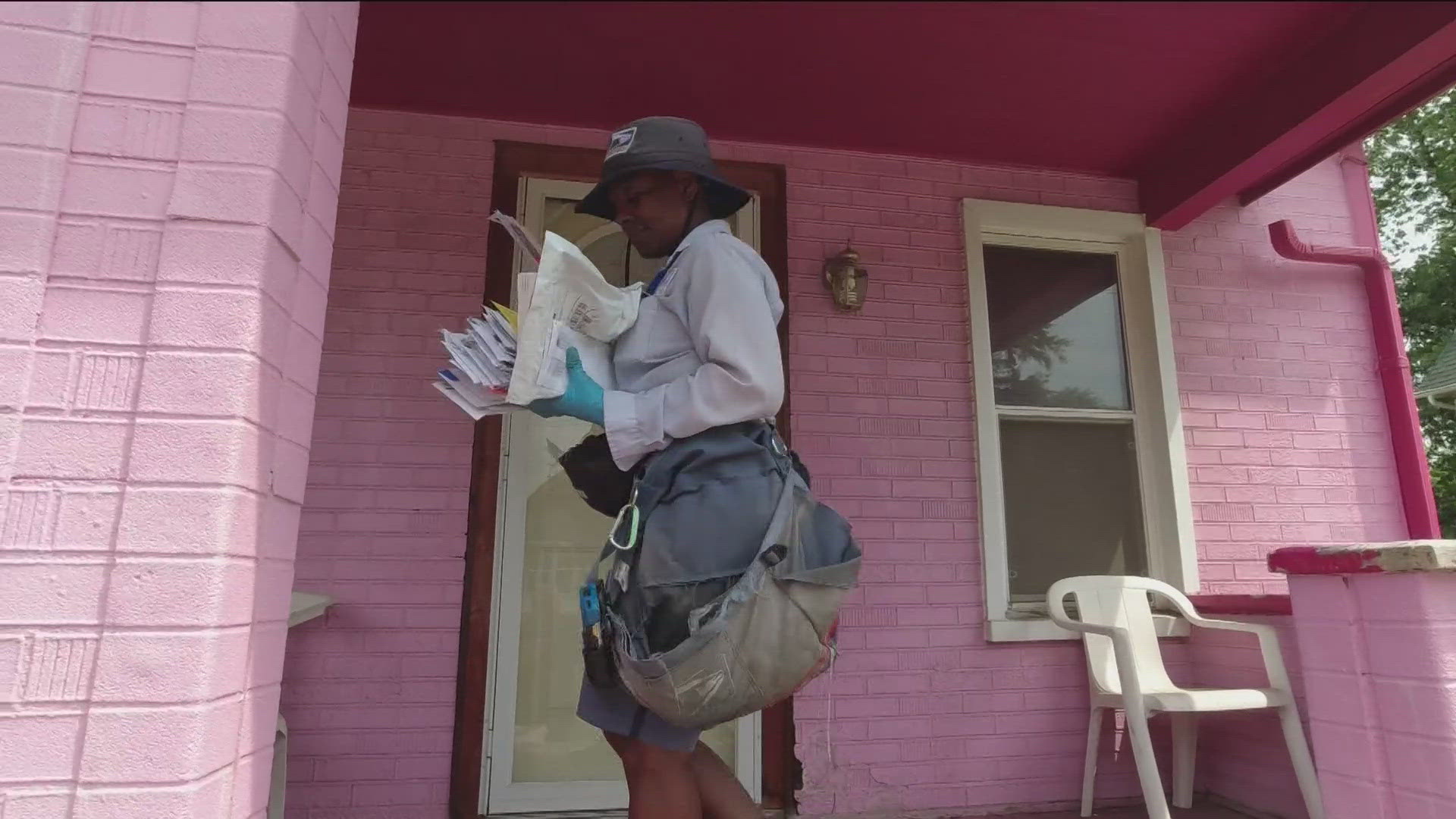 53-year-old Rachelle Roy says she takes a few extra steps to try and keep herself cool while delivering mail in the hot weather.