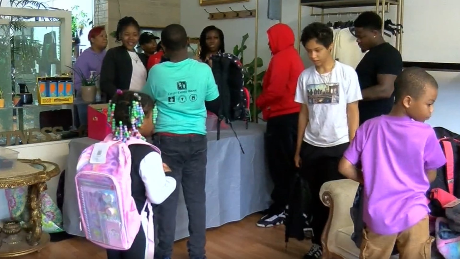 1st Dibz Barbershop handed out 300 backpacks in its first community giveaway.