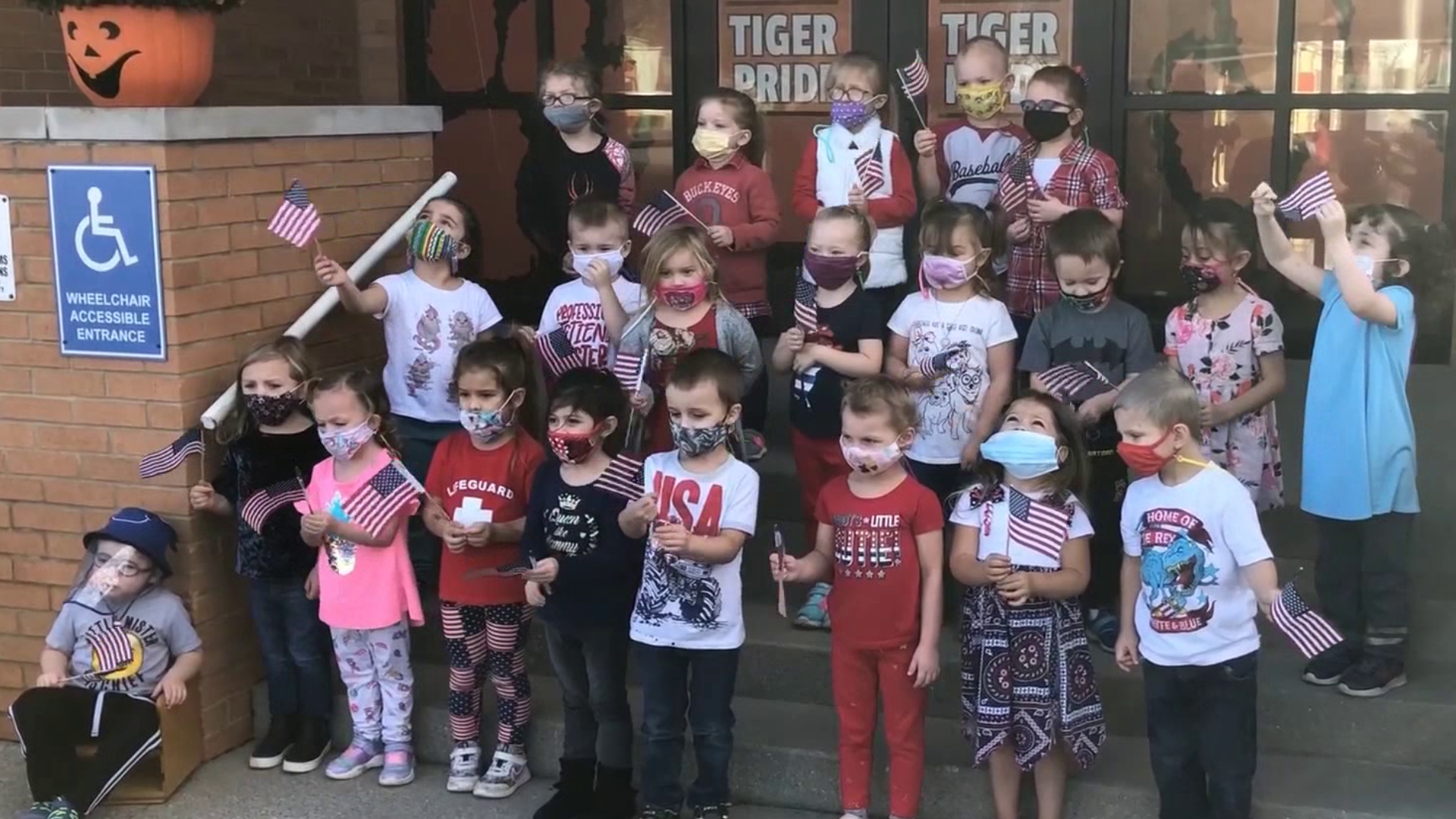 One local school district came together to honor those who have served our country by making signs, waving flags and giving them the fanfare they deserve.