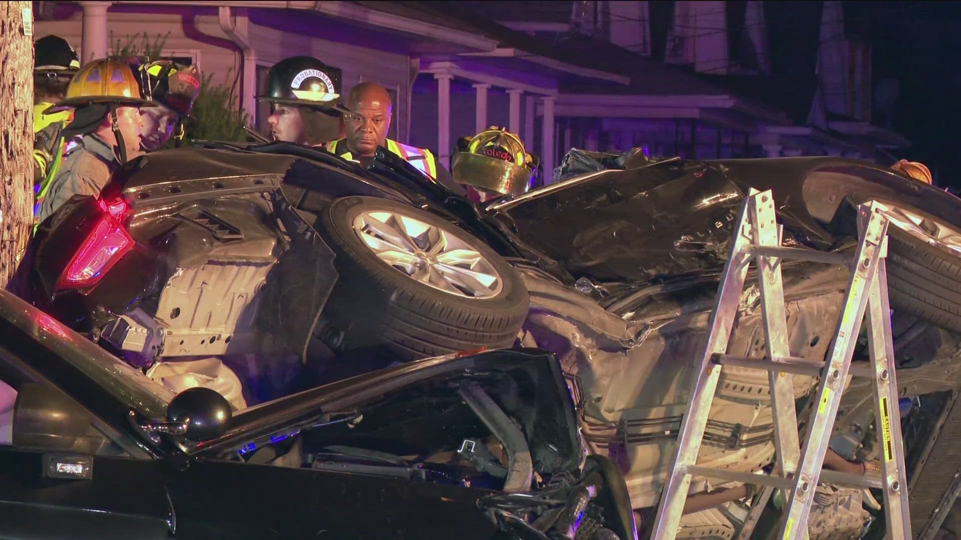 A civilian car flipped onto its side during  crash at Forest and Indiana avenues while a Toledo police gang unit was engaged in an attempted traffic stop