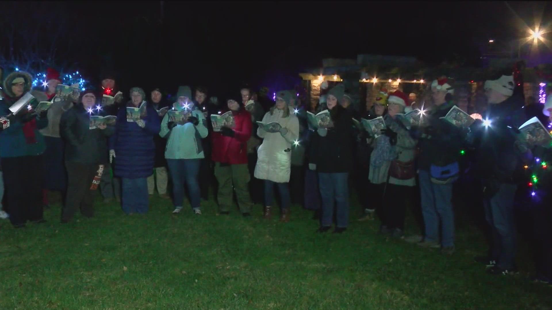 The Toledo Zoo's "Lights Before Christmas" had its annual tree-lighting ceremony Friday night. Before and after, the lines were full of excited happy faces.