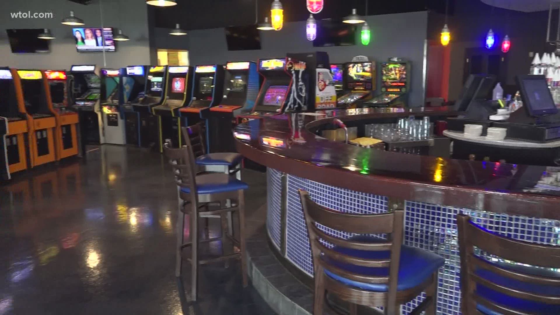 The former site of Fat Fish Blue at Levis Commons now offers an old school video game experience along with an updated menu and drink selection.