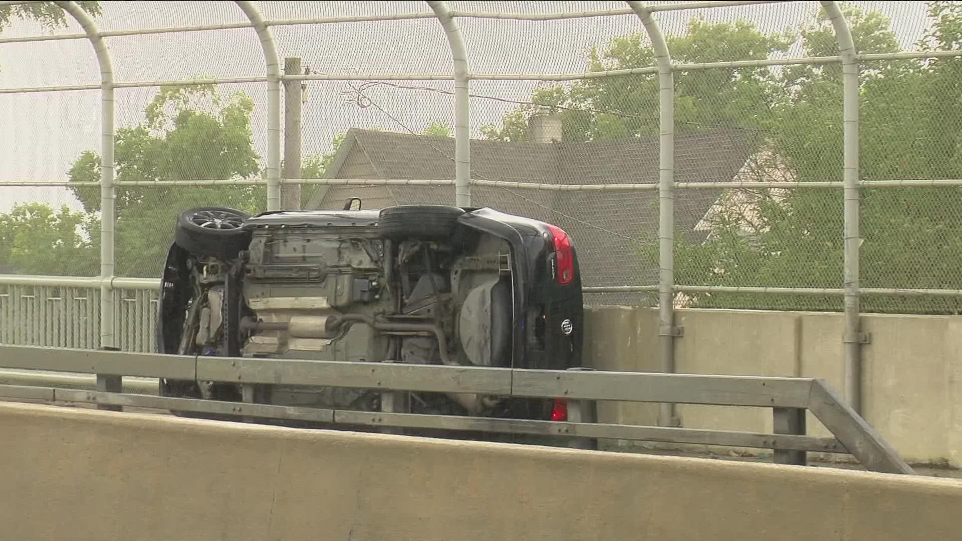 A car landed on its side on Sunday afternoon on the Anthony Wayne Bridge. It's unclear what led to the crash but the driver appeared to be uninjured.