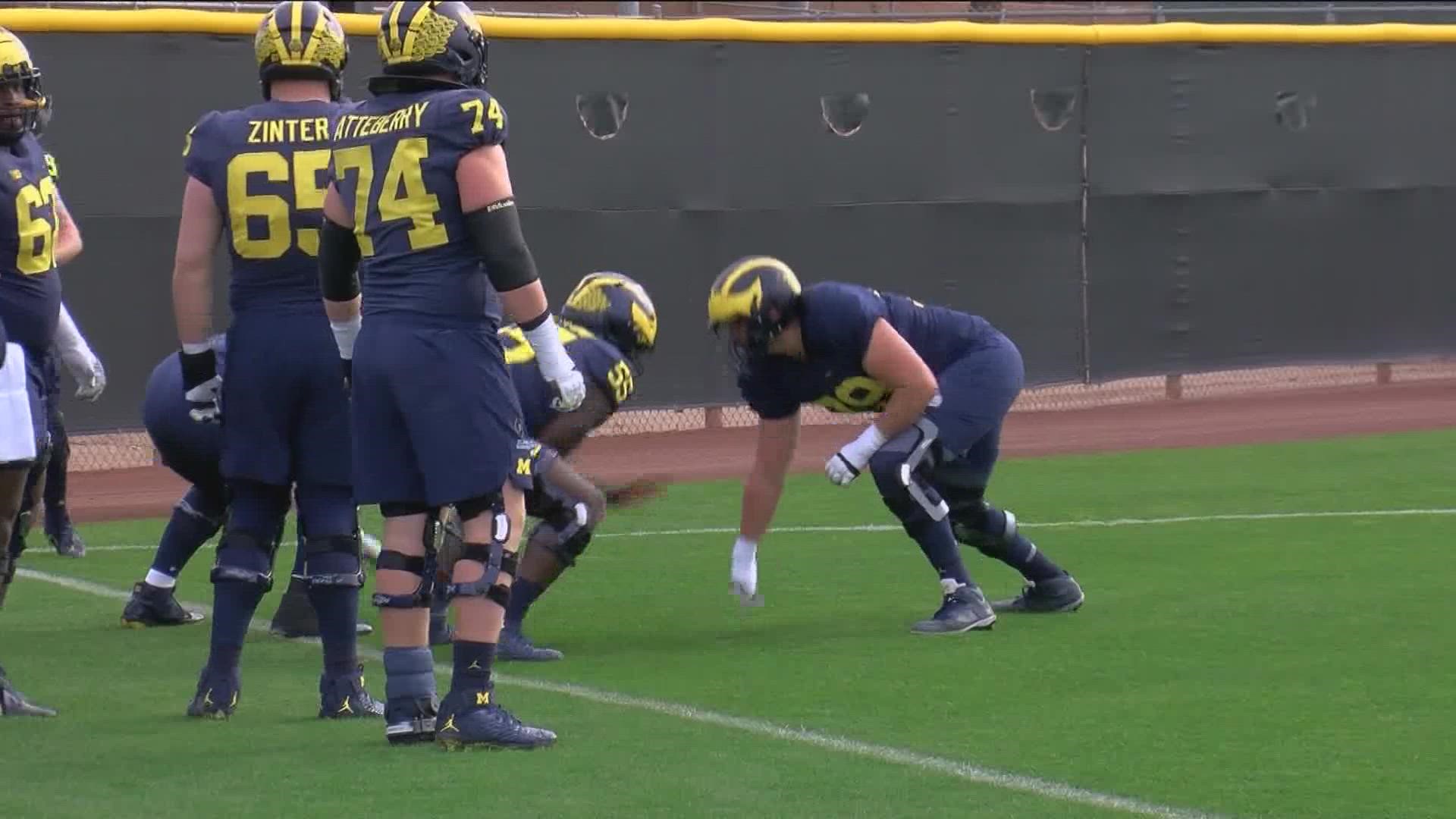 Michigan's offensive line won the Joe Moore Award as the nation's best and will hope to push their way to a win over TCU in the College Football Playoff.