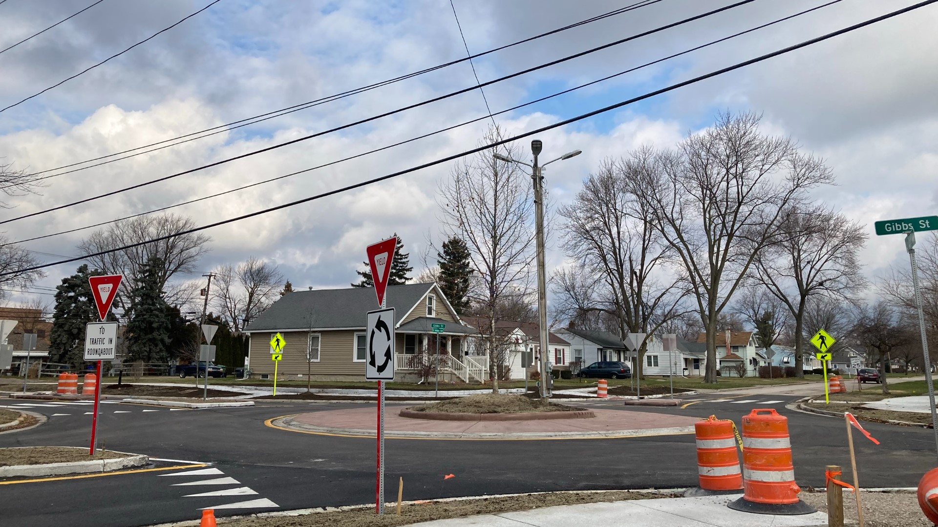 After approximately three months, the intersection has reopened and a roundabout is now in place.