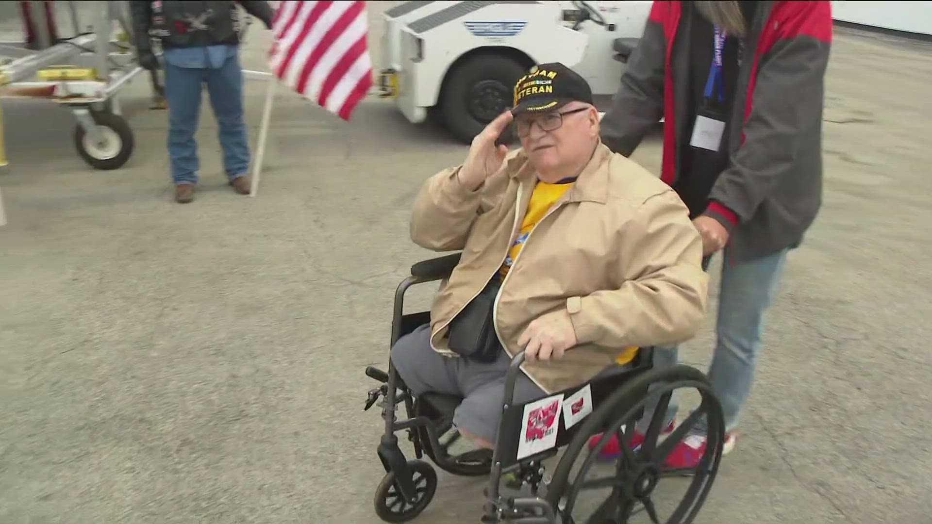 Eager veterans board the plane and settle in as they are minutes away from heading to Washington, D.C.