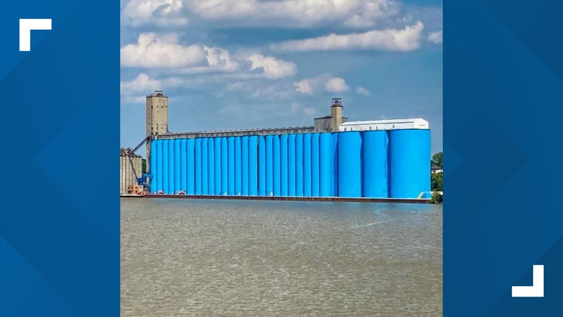 Why are they painting the grain elevators downtown?