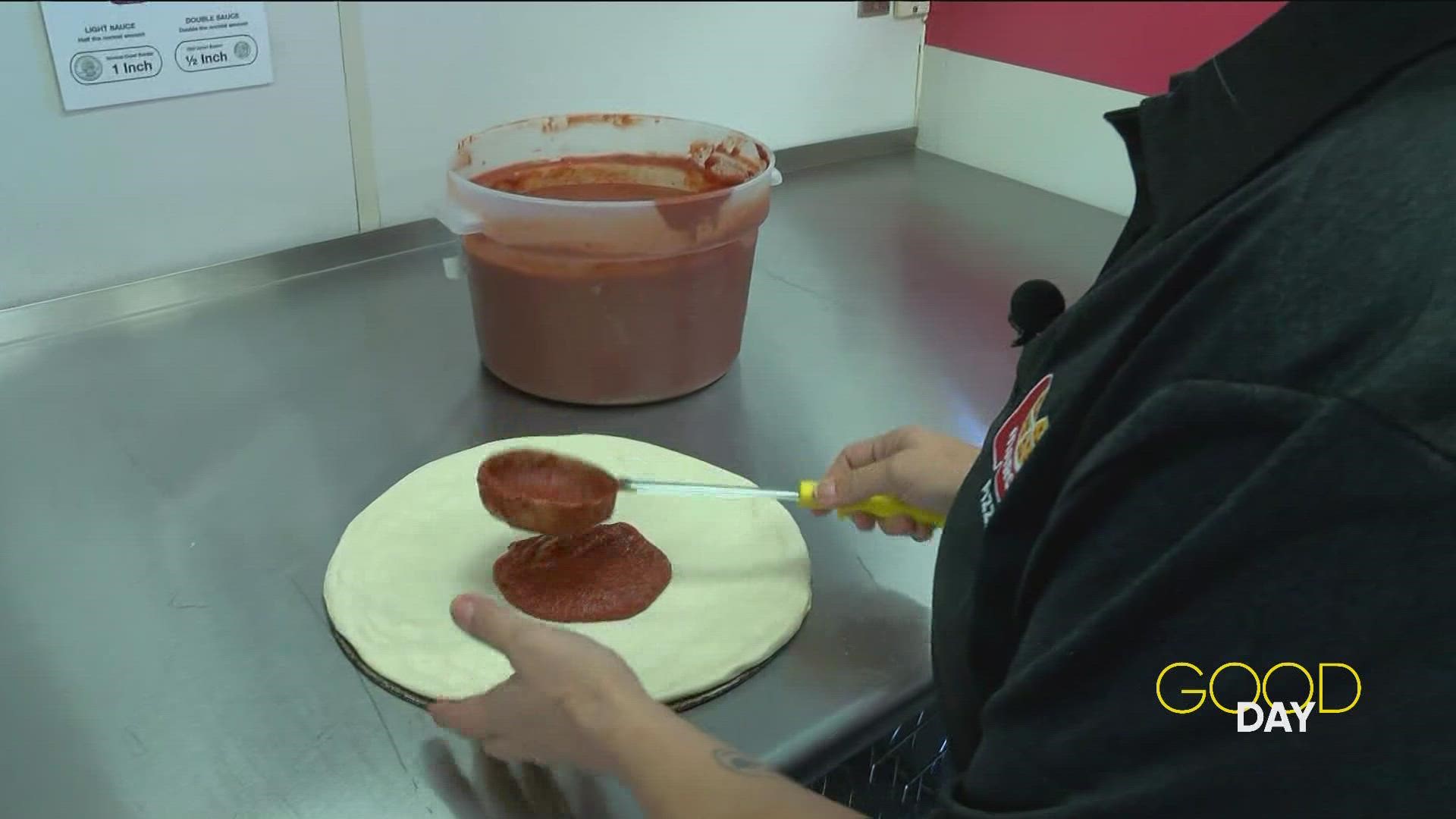 Kera Jones, of Marco's, is among the finalists in the chain's fast-and-accurate pizza-making competition. WTOL 11 meteorologist Ryan Wichman tries his hand at it.