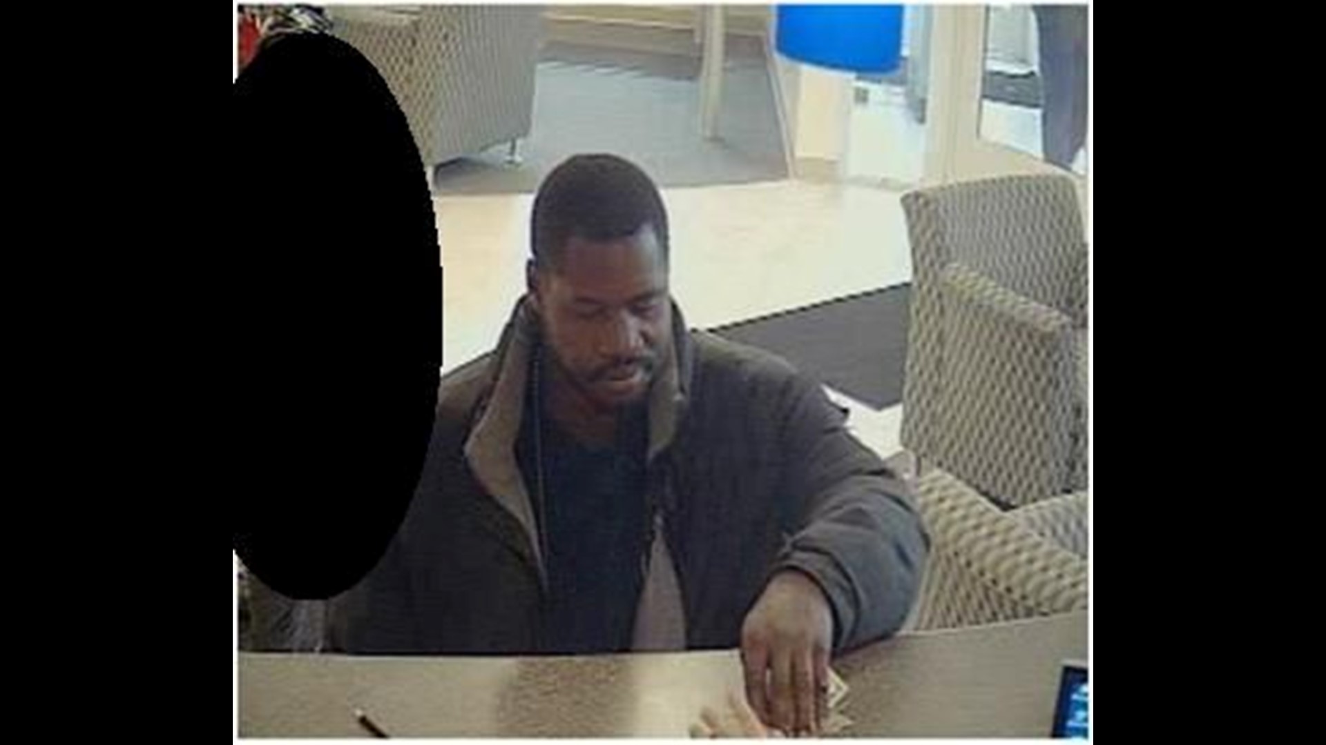 North Toledo bank robbery suspect turns self in