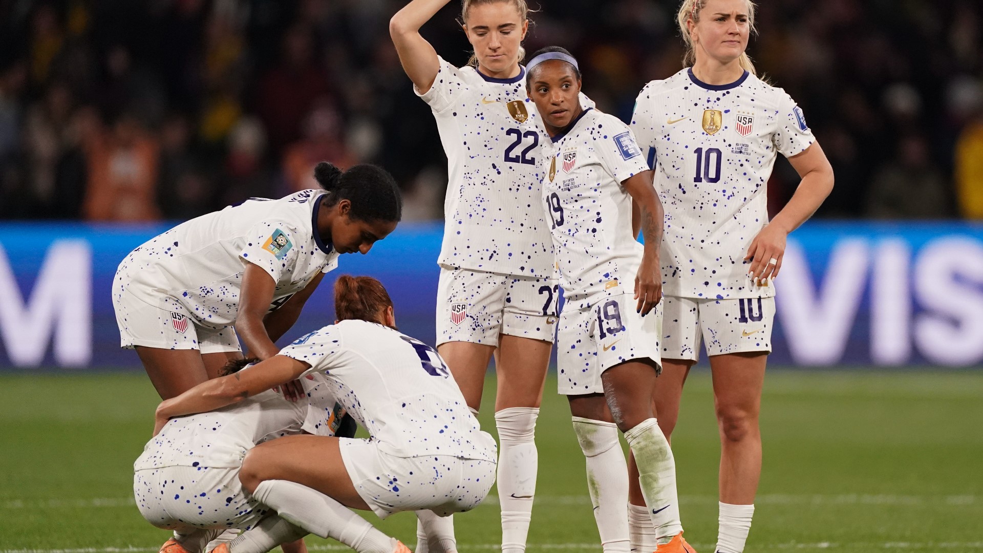 Dejected French players take off their World Cup runners-up medals