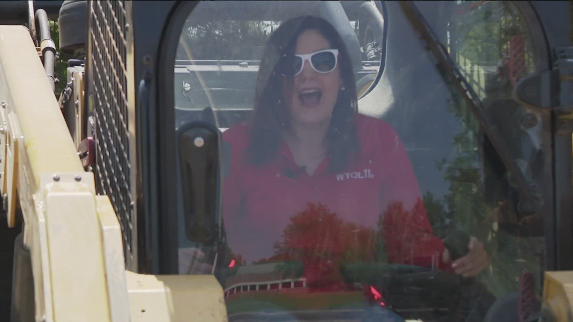 Amanda gets some lessons from Buck Brothers Asphalt Paving & Concrete.