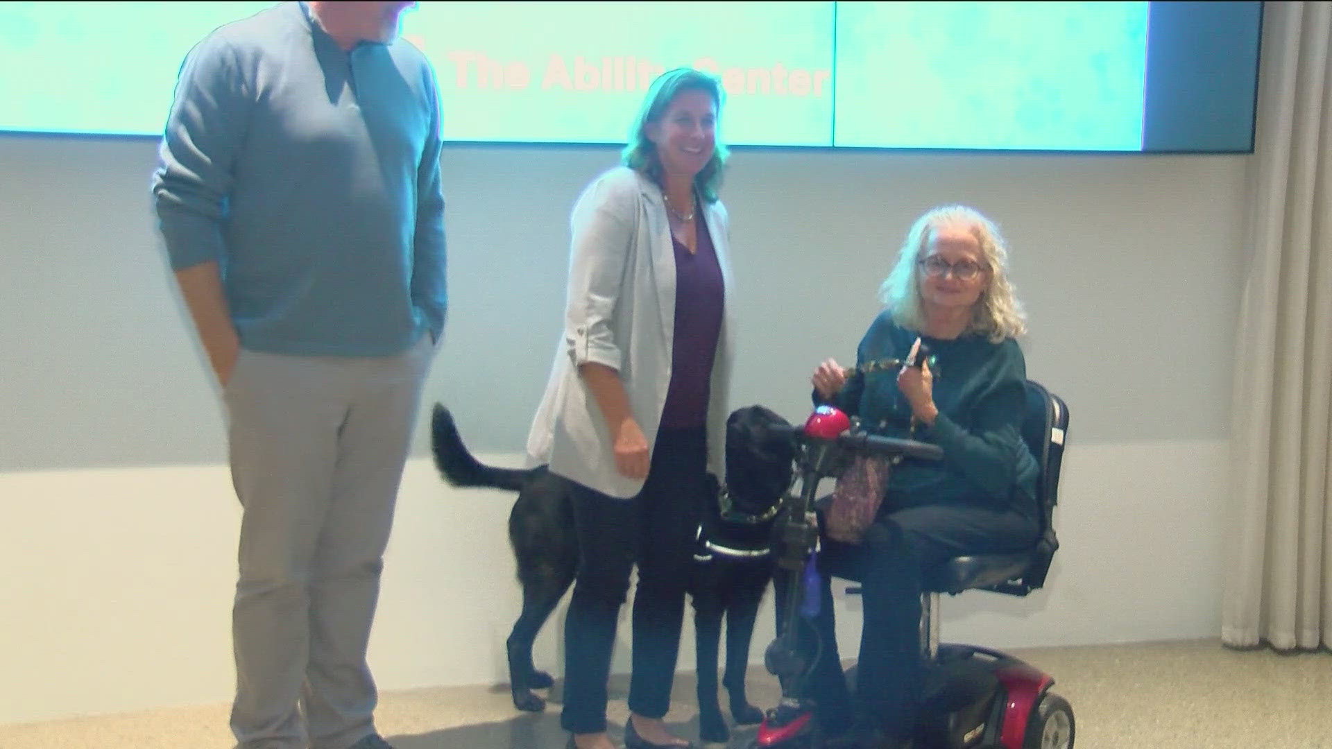 A special passing of the leash ceremony on Friday signified the 11 dogs going from their foster homes to the people they will now help.