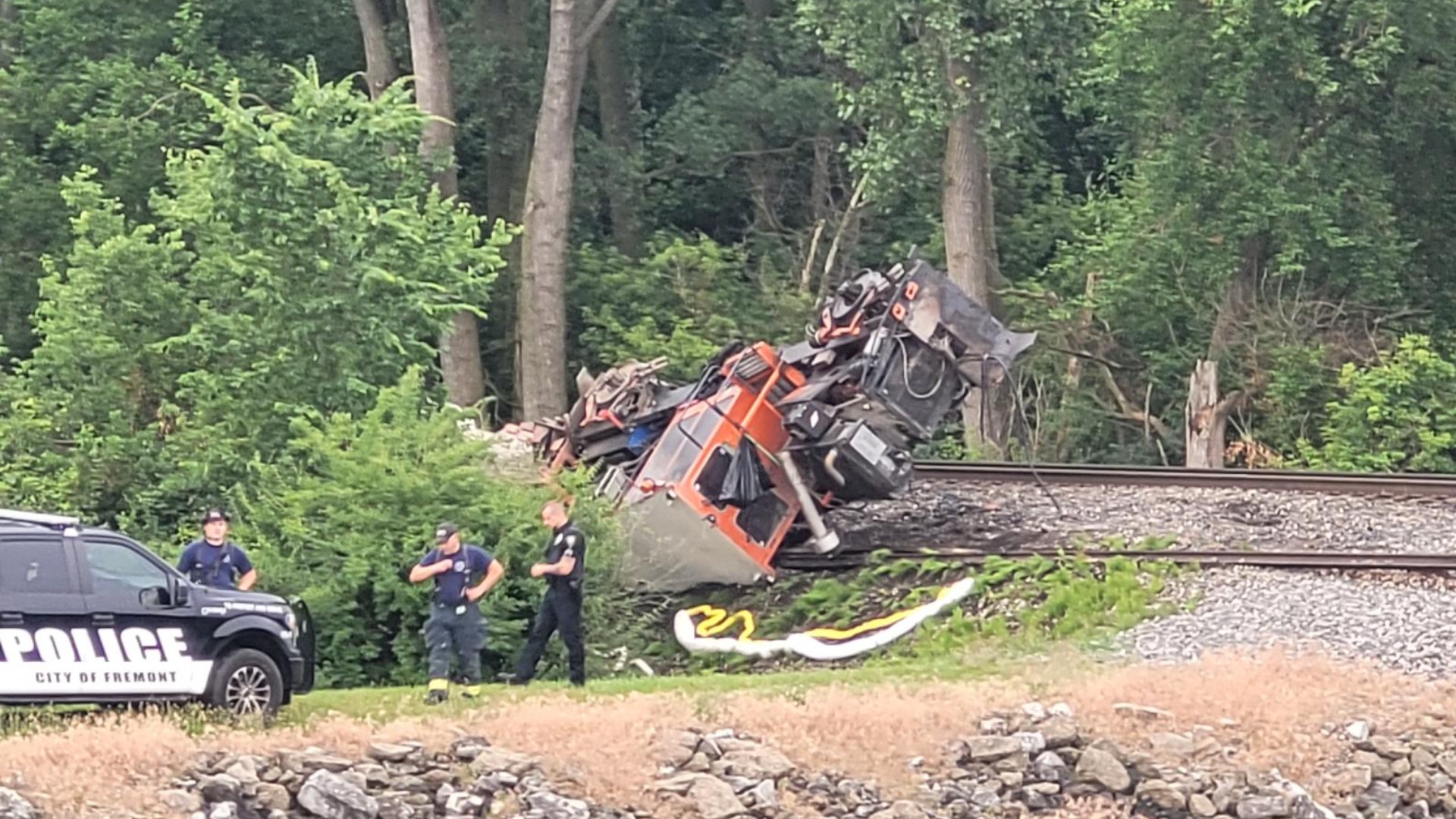 Large railroad machine falls off tracks in Fremont | wtol.com