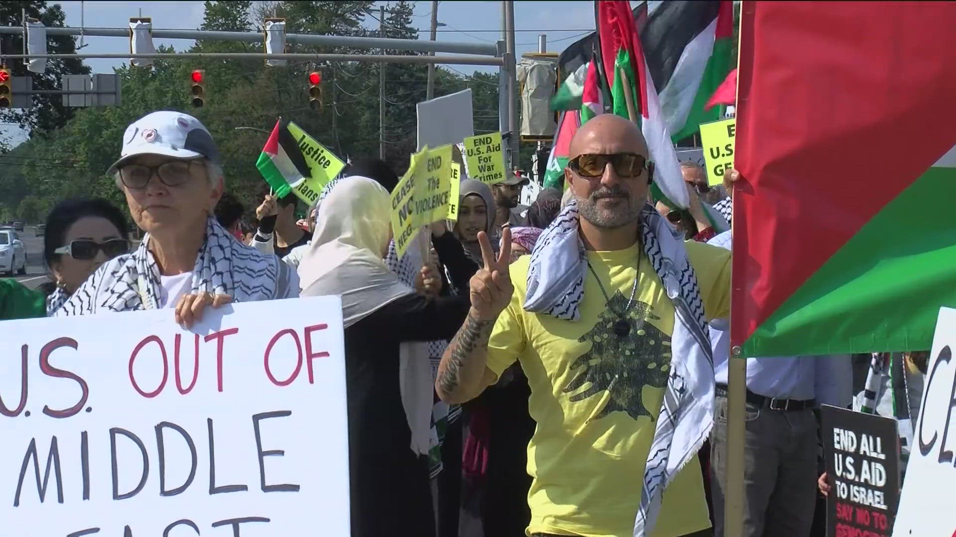 Marchers on the corner of Talmadge and Sylvania called on the US government to do more to create conditions for an end to the escalating violence in the region.