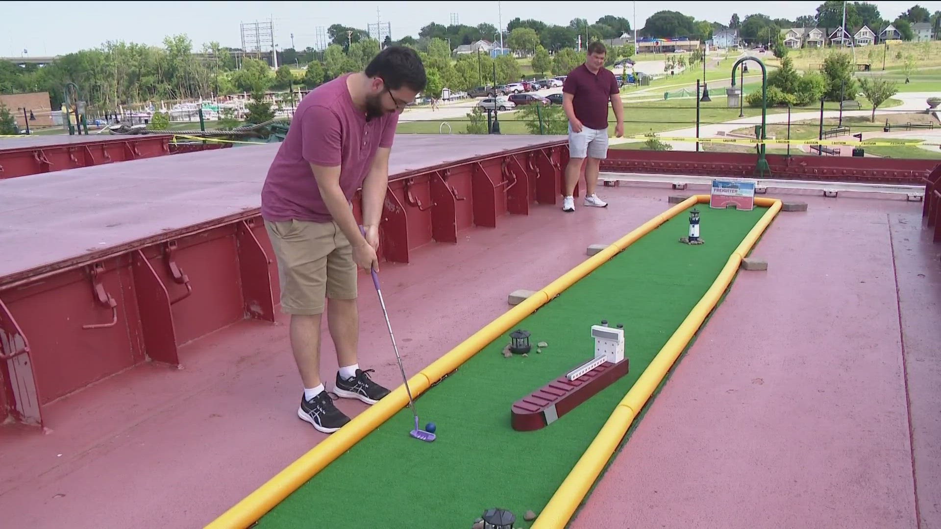 The Museum of the Great Lakes hosts an event that lets visitors putt aboard a ship docked along the Maumee River to celebrate next week's Dana Open LPGA tournament.