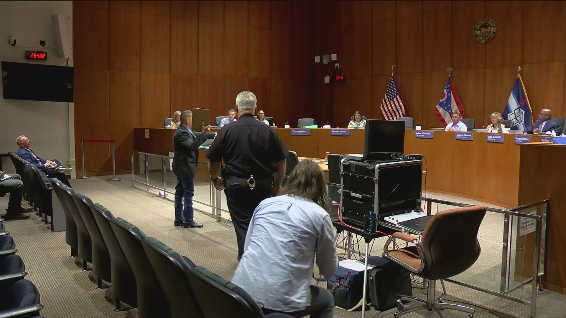 Roberto Torres says he was at the meeting to present more than 300 signatures against rezoning that would allow a mining operation in Toledo.