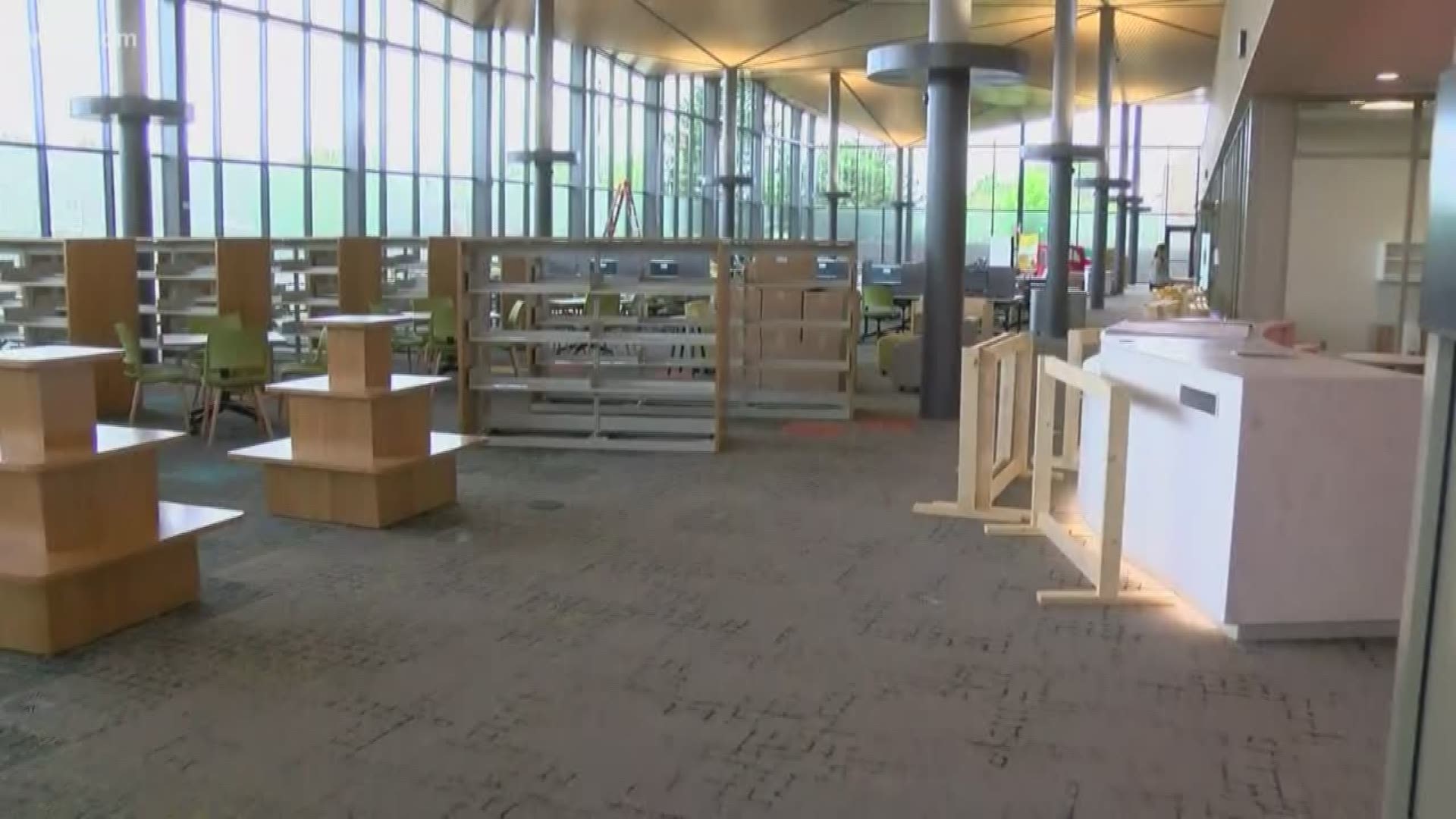 The new library opens June 7 and features a cafe area, media space, book-reserve lockers and more