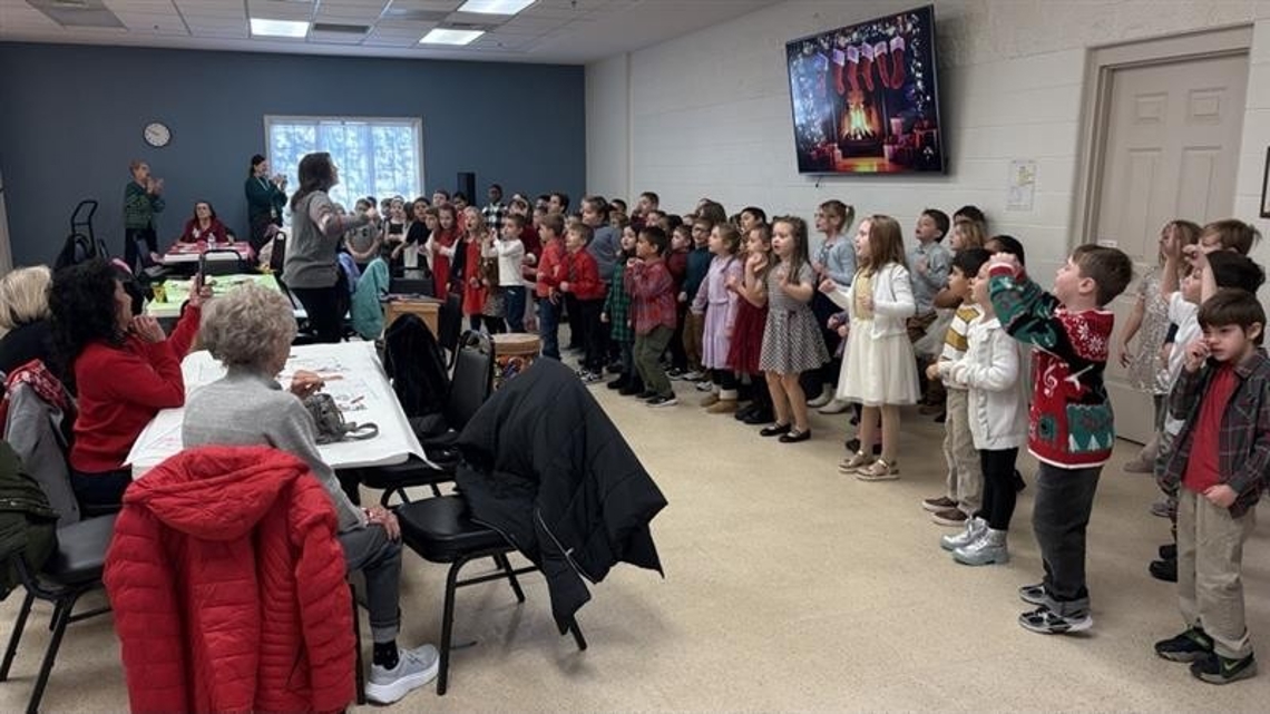 Maumee students spread holiday cheer with seniors at annual 'Fancy in First Grade' event