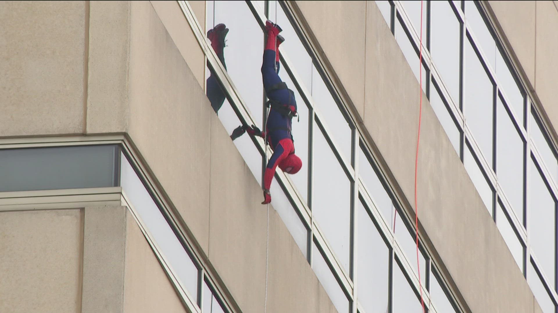 Officers dressed as super heroes gave patients at ProMedica Children's Hospital an early Halloween treat Thursday.