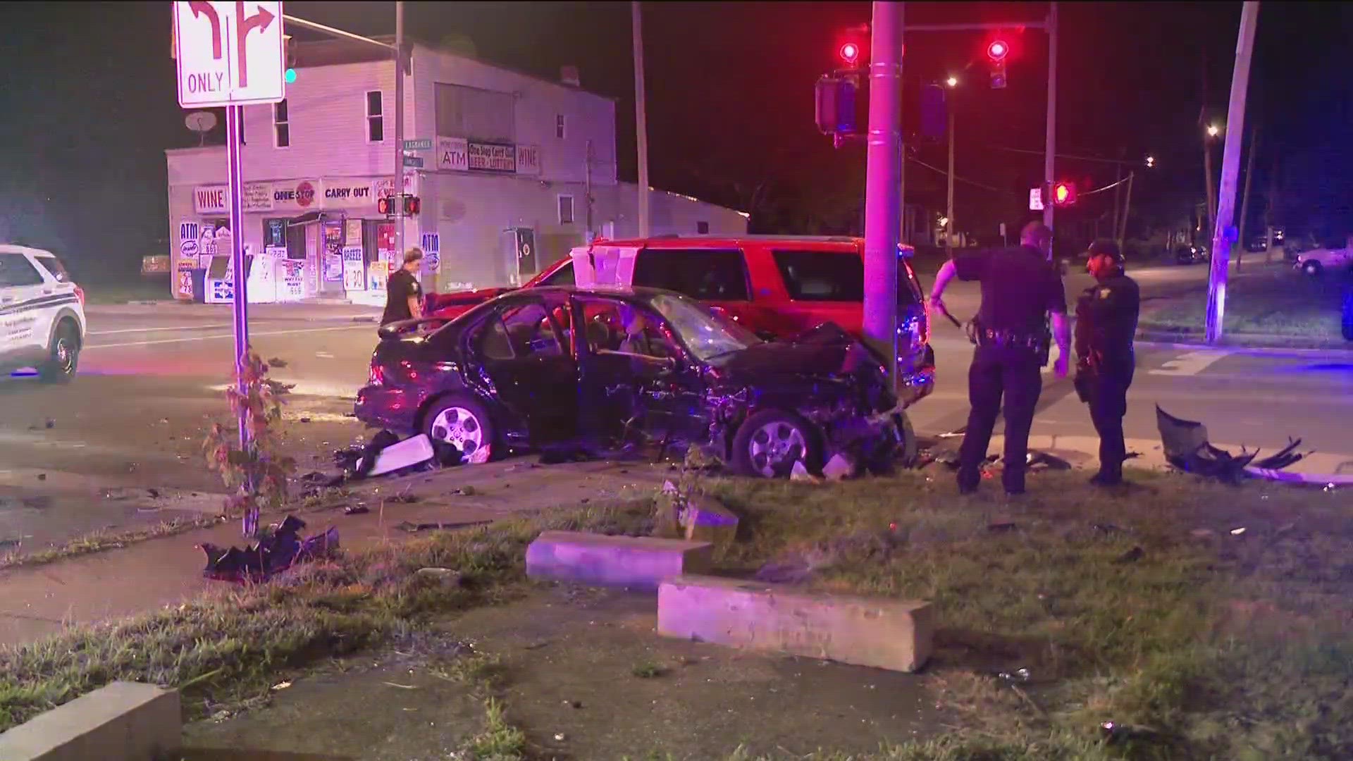 A car and SUV collided with one another, which then caused the car to hit a metal pole, according to police.