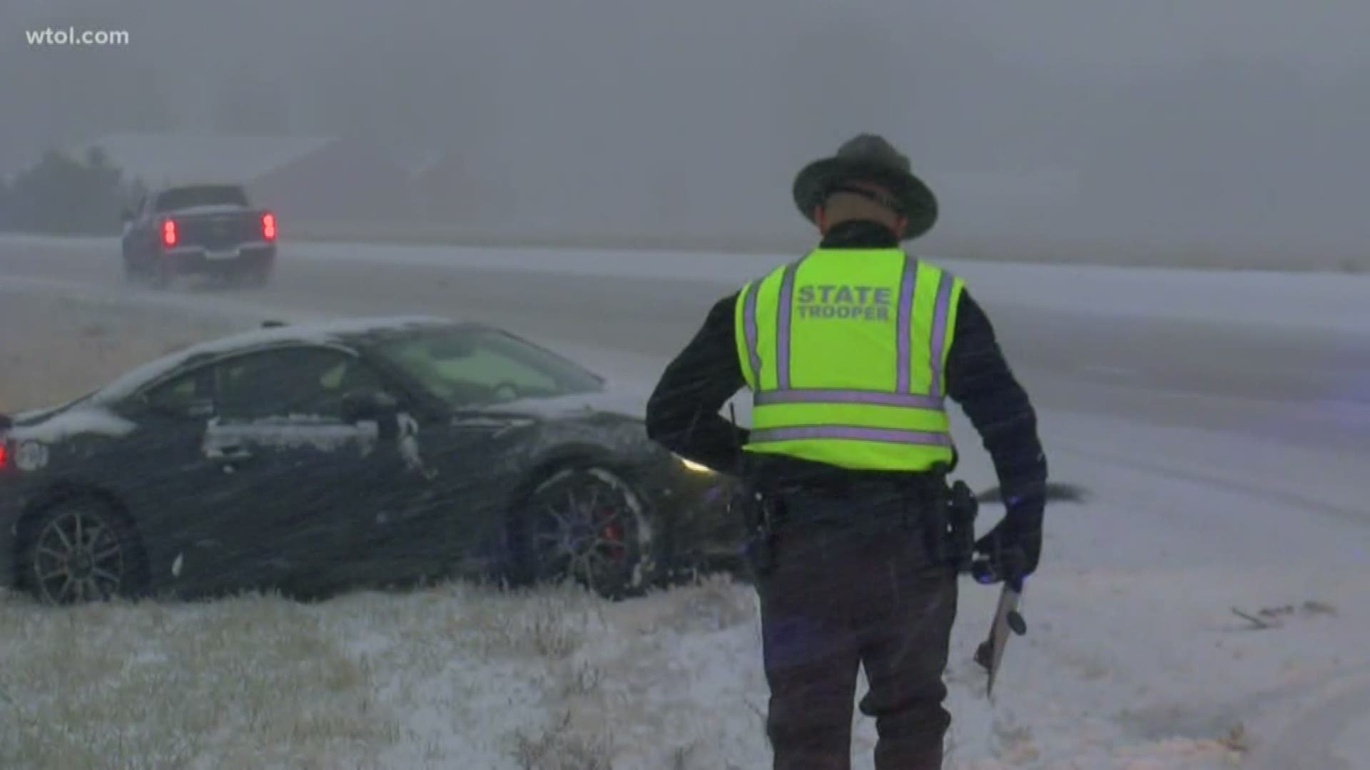 A semi-trailer failed to stop when approaching an active accident scene near Providence Twp. and crashed into two police cruisers and another car.