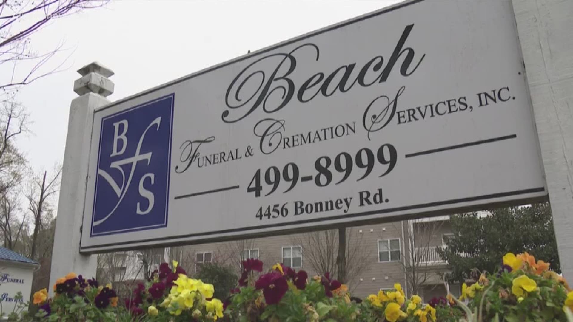 Funeral homes are greeting the bereaved with gloves, masks and sanitizer. To limit the spread of coronavirus, funeral homes are cutting back visitors to services.