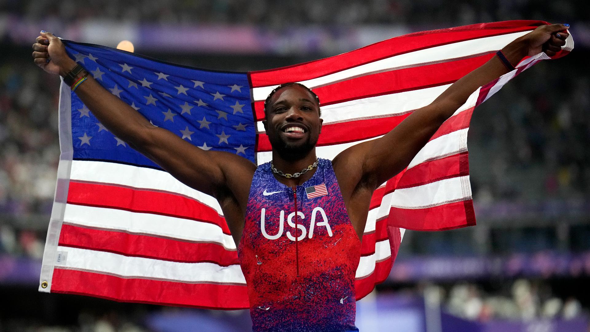 Lyles had photo finish and came out on top. He's now the "world's fastest man."