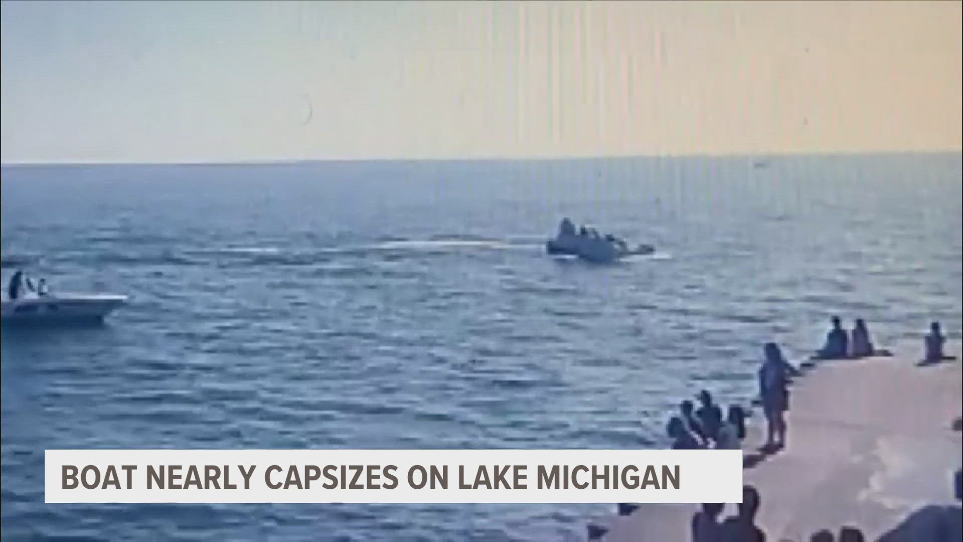 The boat nearly capsized as it hit a wave in South Haven.