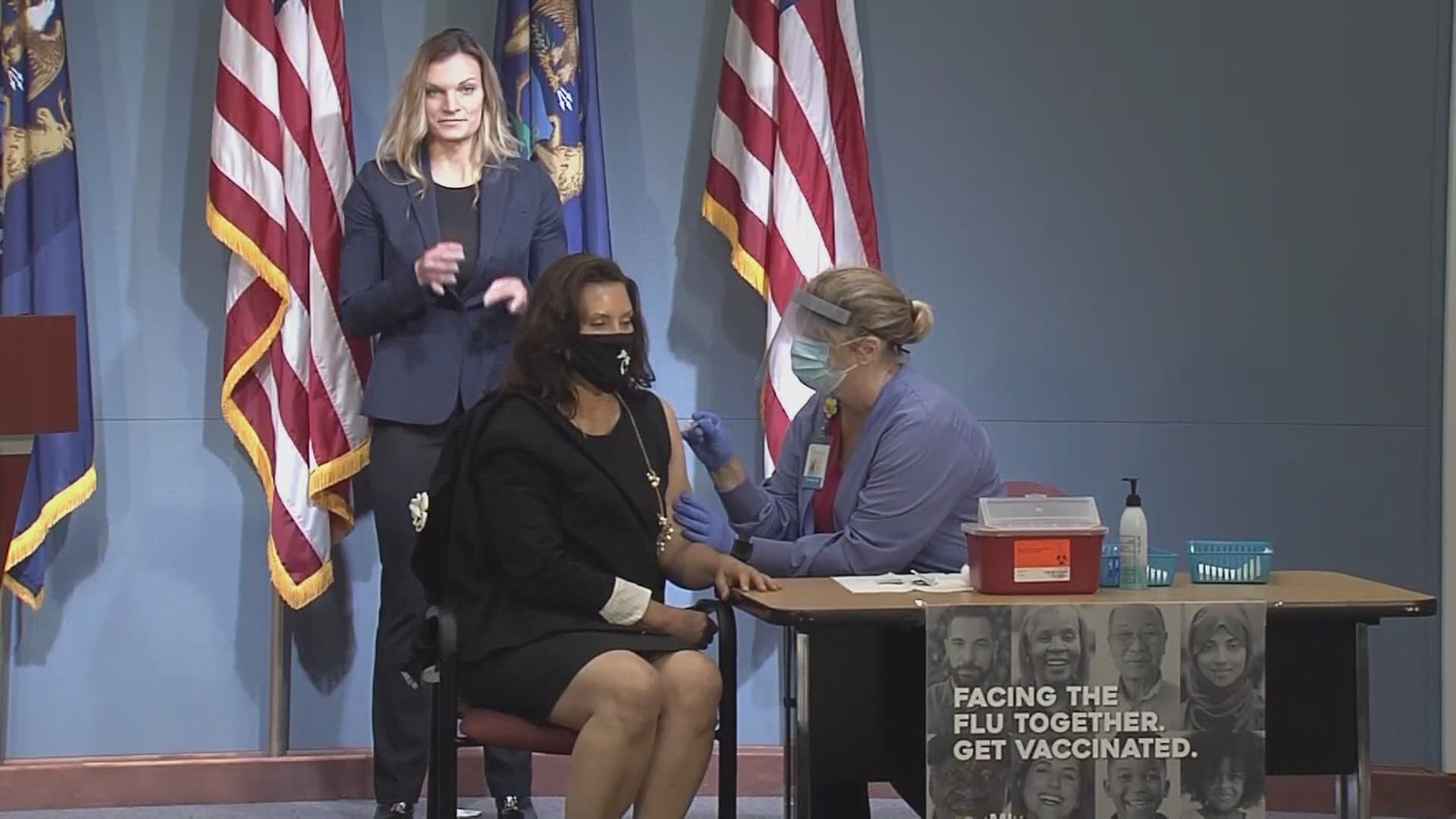 Whitmer received a flu shot during a news conference to “show how easy it is.”